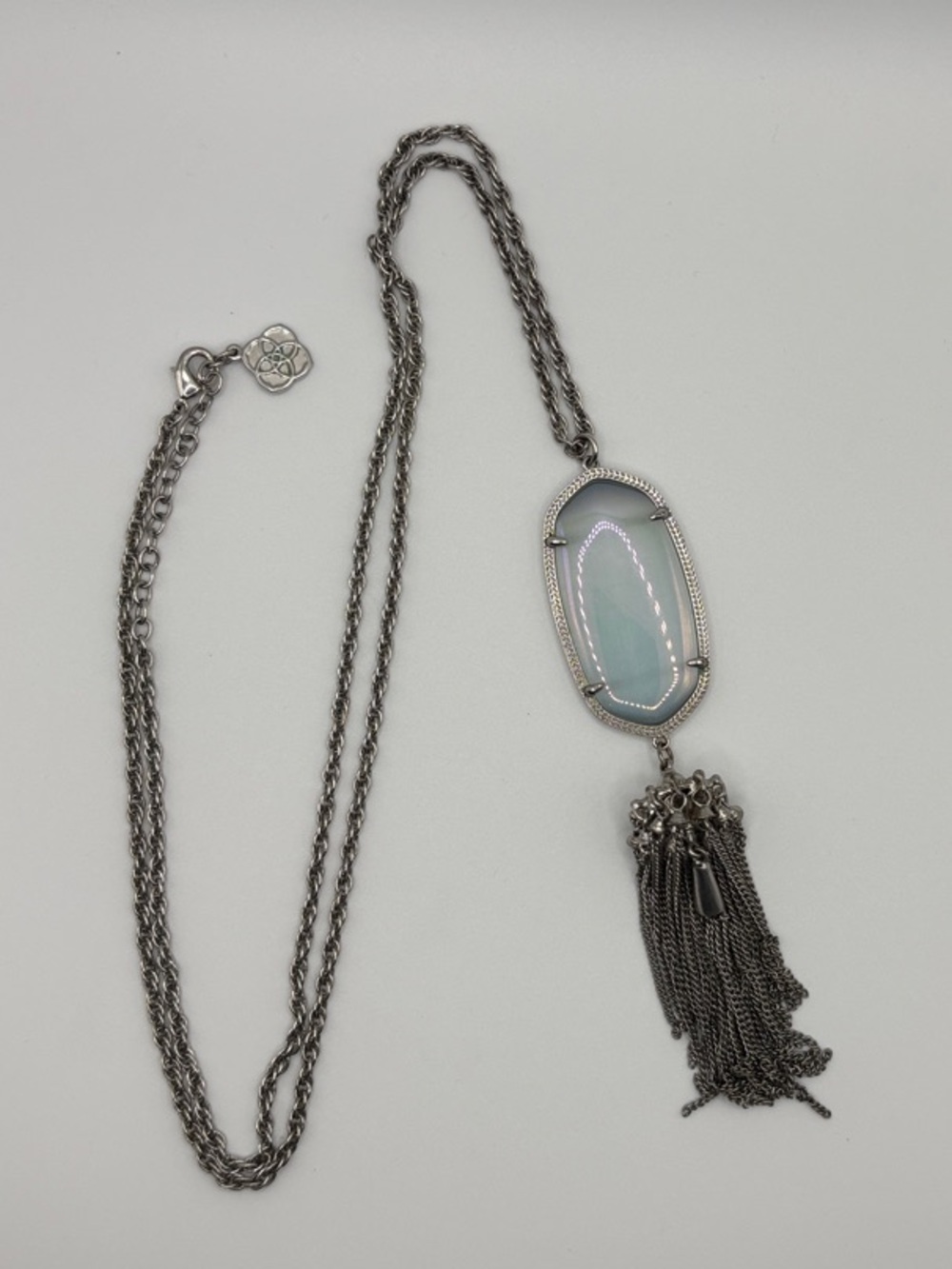 Silver-Tone Pendant Necklace with Pale Blue Stone and Tassel